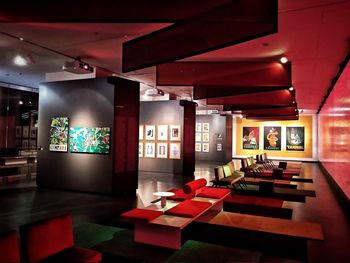 Empty chairs and tables in restaurant