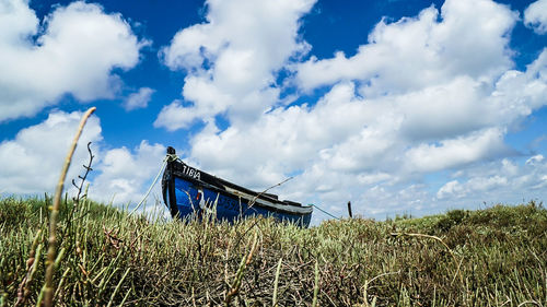 Traditional windmill against blue sky