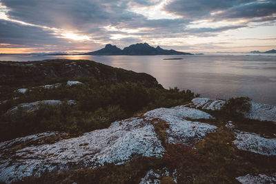 View of mountain island in a cloudy sunset