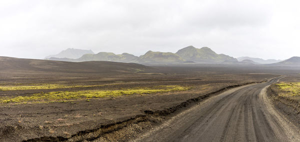 Gravel road in iceland's highlands leading to adventure