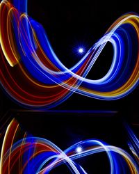 Light painting against black background