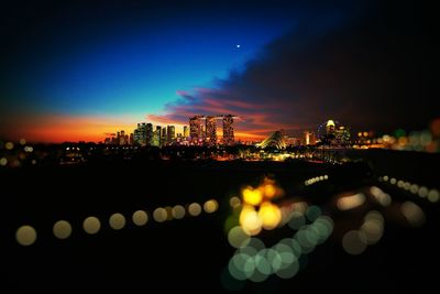 Illuminated cityscape at night