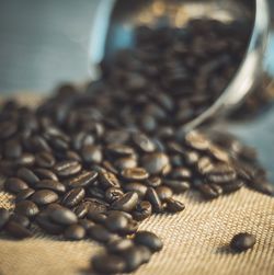 Close-up of coffee beans on table