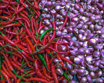 Full frame shot of red chili peppers for sale at market stall