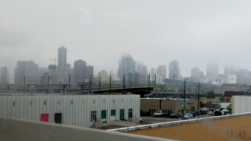 View of cityscape against clear sky