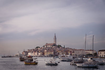 Boats moored at harbor