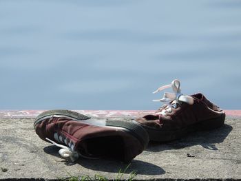 Man lying down on sand at beach