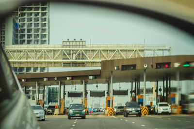 Cars on bridge in city