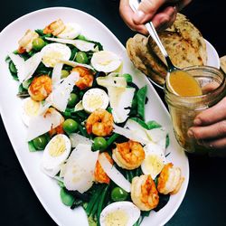 Close-up of hand serving food