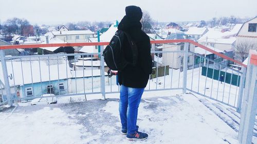 Full length of a man on snow covered landscape