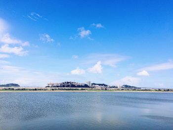 Scenic view of sea against cloudy sky