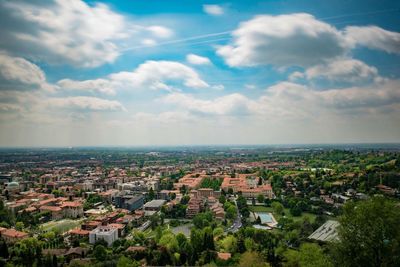 Aerial view of cityscape against sky