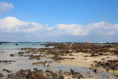 Scenic view of beach against sky