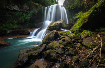 View of waterfall in forest