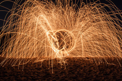 Firework display at night