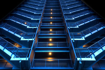 Low angle view of staircase at night