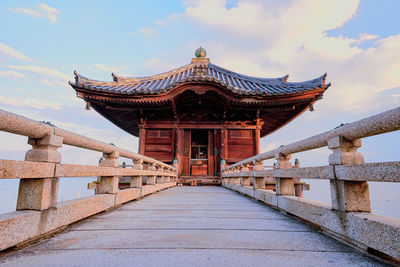 View of temple building against sky