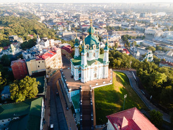 High angle view of illuminated buildings in city