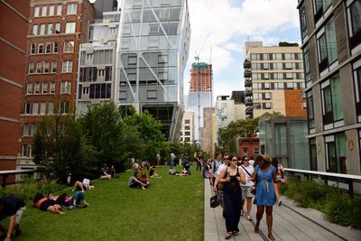 Panoramic view of people in city