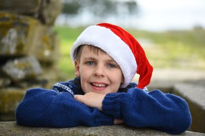 Portrait of smiling boy in hat