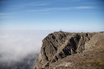 Scenic view of cliff against sky