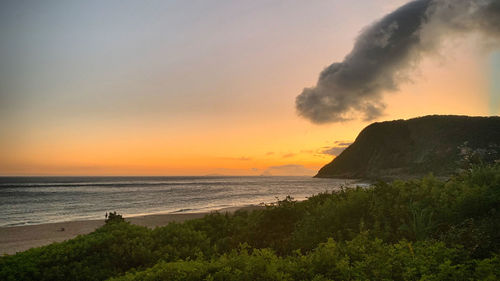 Scenic view of sea against sky during sunset