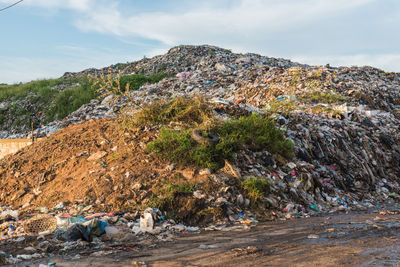 Dumping ground against sky