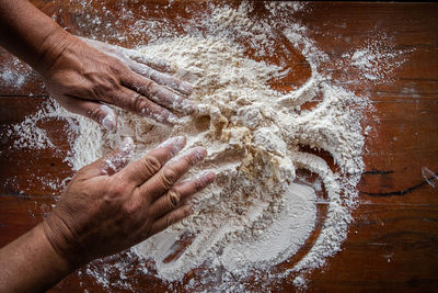 High angle view of person preparing food