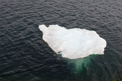 High angle view of ice floating on sea