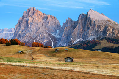 Scenic view of rock formations against clear sky during autumn
