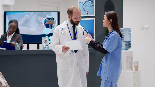 Portrait of doctor standing in hospital