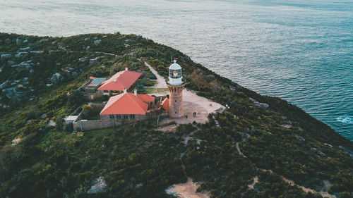 High angle view of houses on beach by sea