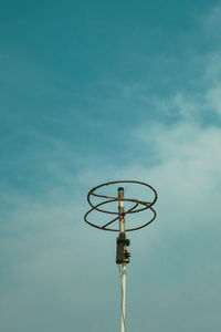 Low angle view of basketball hoop against sky