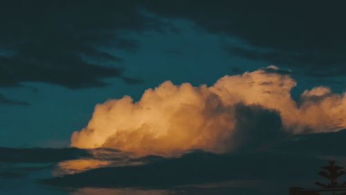 Low angle view of dramatic sky during sunset