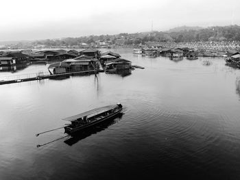 High angle view of river by buildings in city