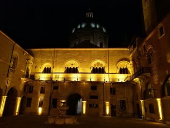 Exterior of historic church at night