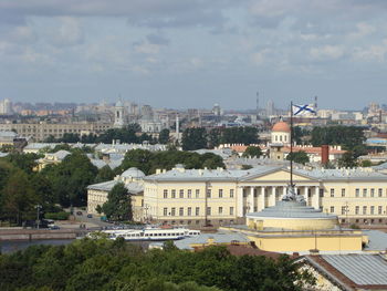High angle view of buildings in city against sky