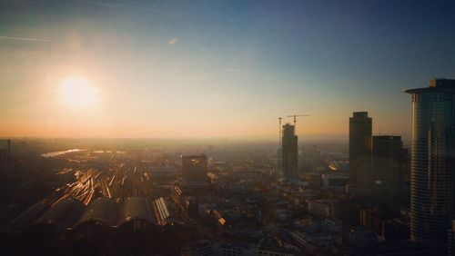 High angle view of buildings against sky during sunset