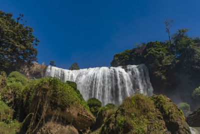 Low angle view of waterfall