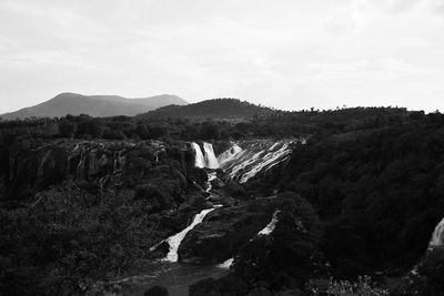 Scenic view of rock formations against sky