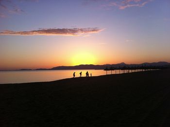 Scenic view of sea at sunset