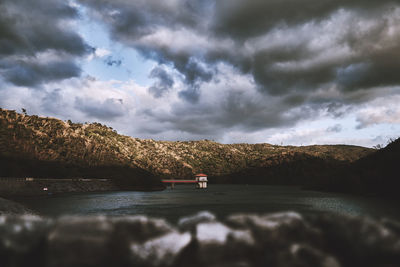 Scenic view of sea against cloudy sky