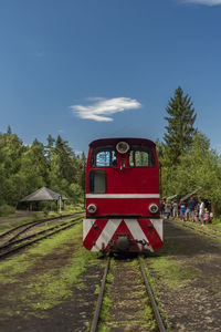 Train on railroad track against sky