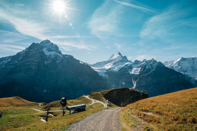 Scenic view of snowcapped mountains against sky