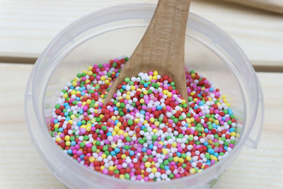 Close-up of multi colored candies in bowl