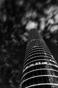 Low angle view of skyscraper against sky
