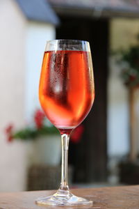 Close-up of wineglass on table