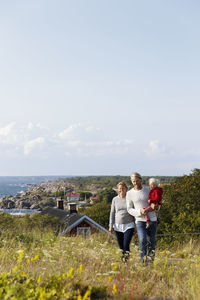 Parents walking with son