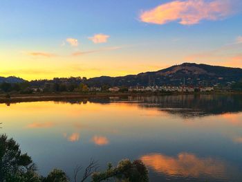 Scenic view of lake during sunset