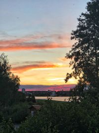 Scenic view of landscape against sky during sunset